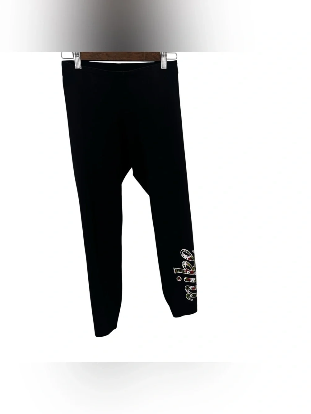3/$15 Nike Black pull on Leggings with floral graphic print size M